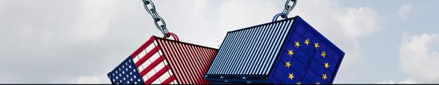 USA and European Union flags on freight containers