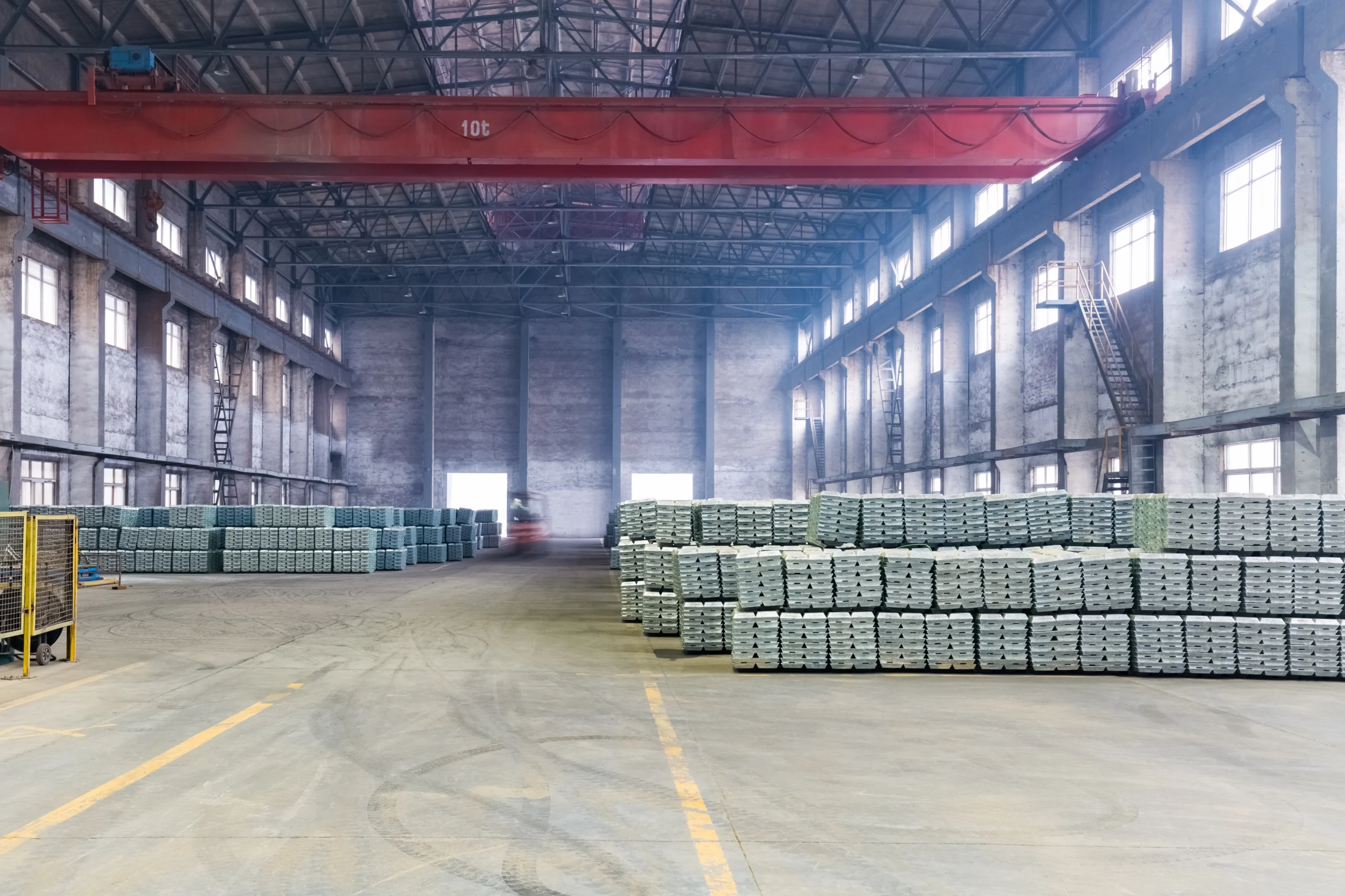 Interior of a finished products warehouse in an FTZ, featuring stacked inventory prepared for domestic and international shipment.