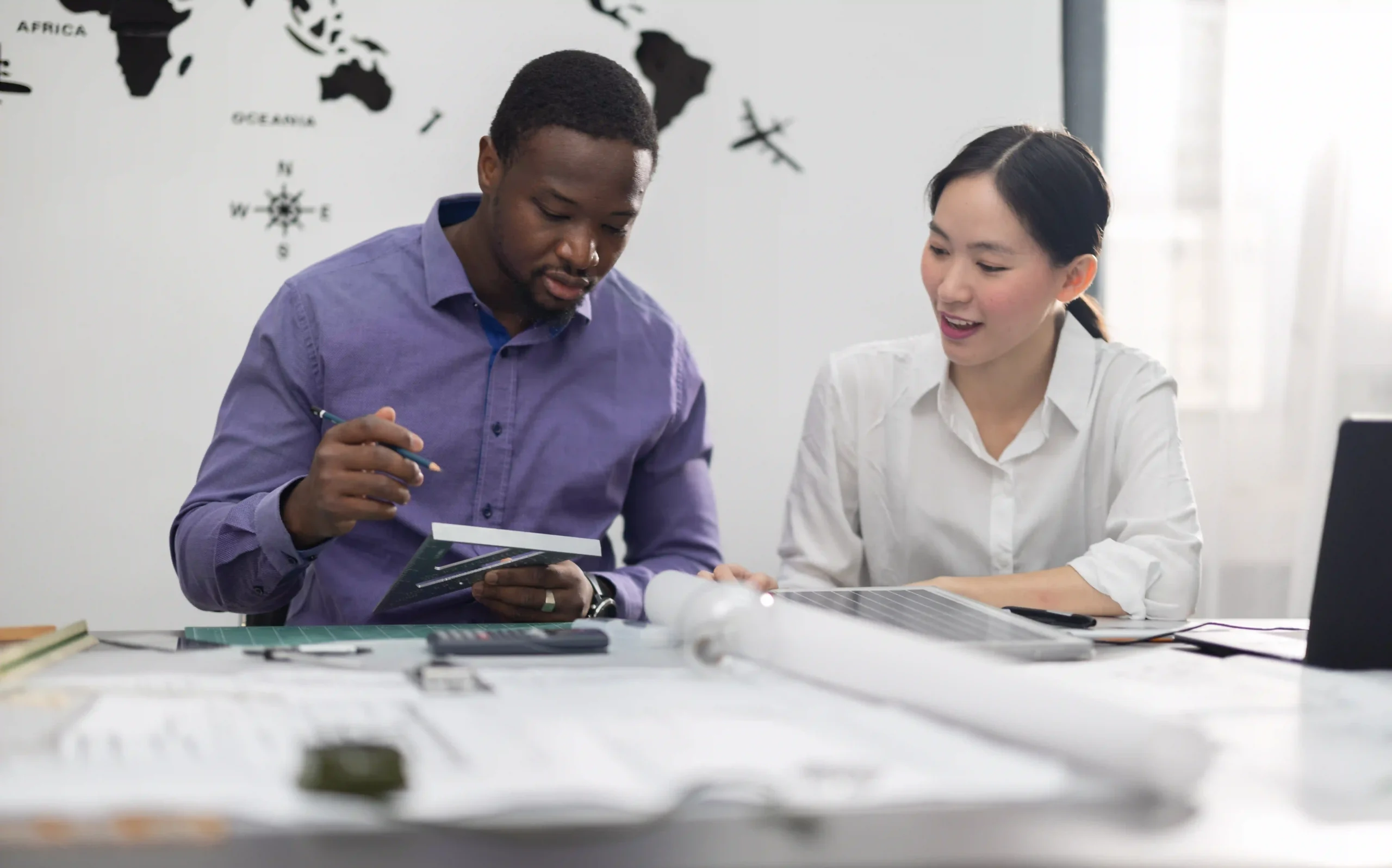 FTZ consulting specialists analyzing import/export documentation and compliance requirements for Foreign Trade Zone operations.