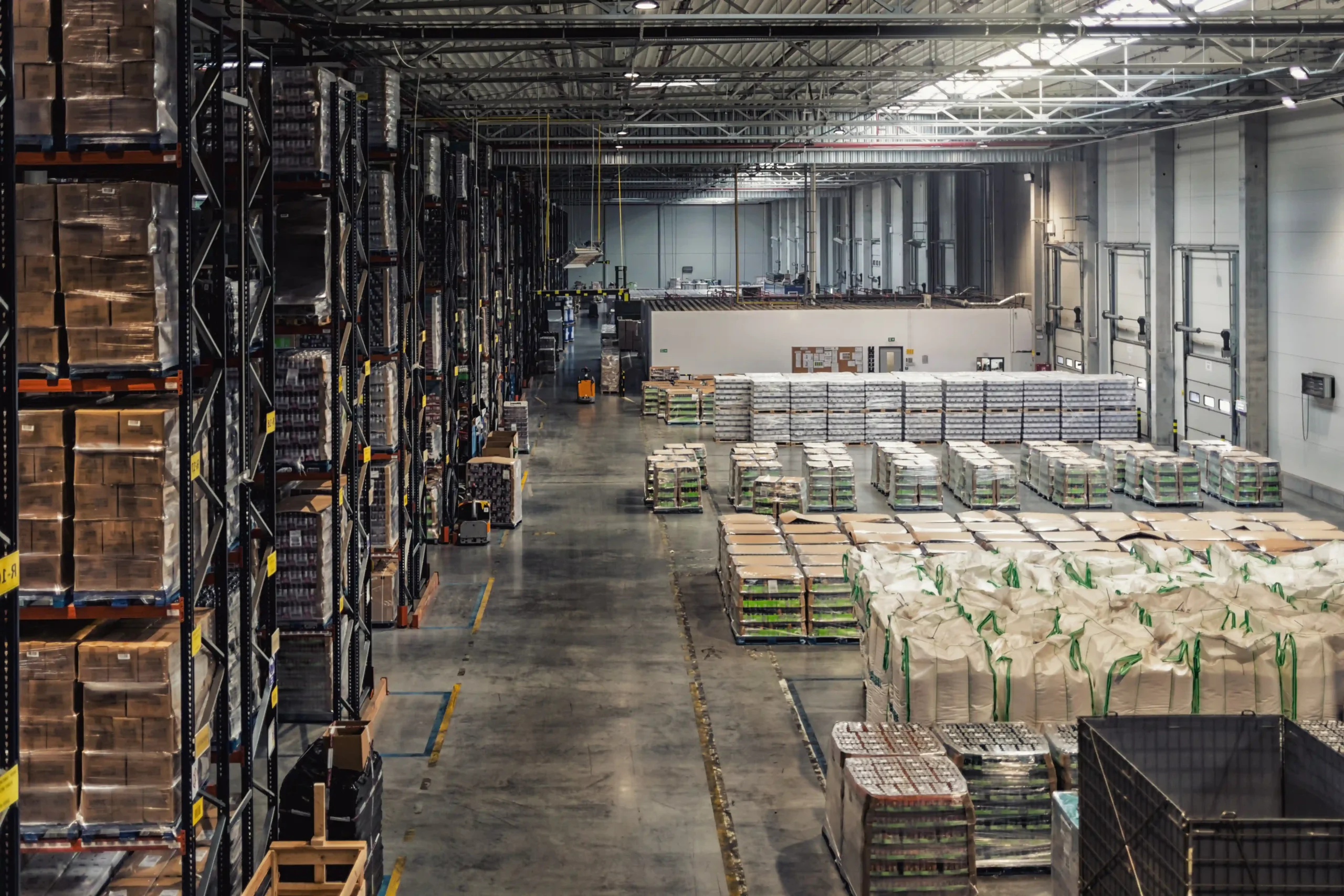 A vast dedicated storage space with high shelving for bulk inventory storage.