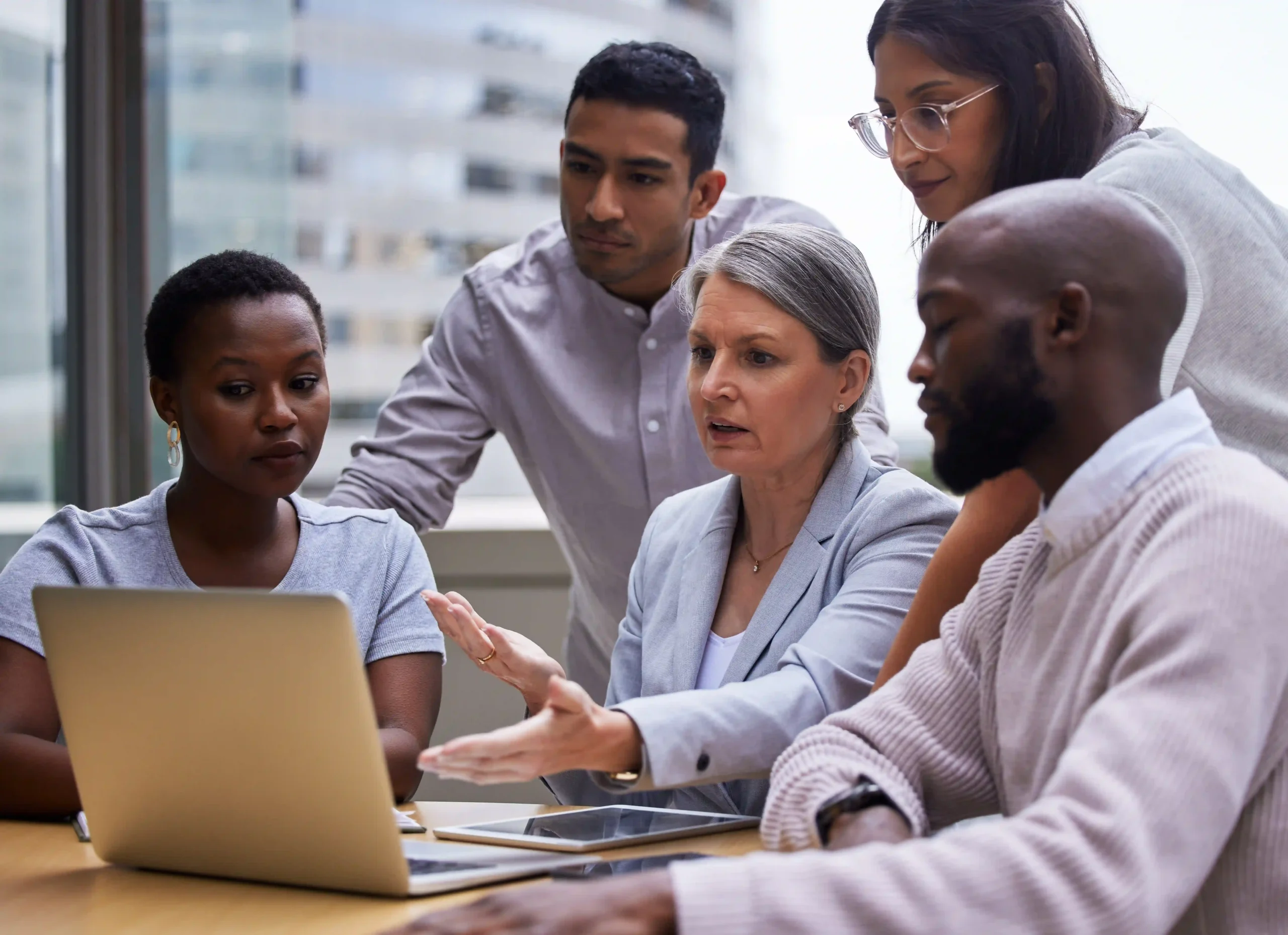 Corporate professionals reviewing policies to understand who regulates EPA and its role in environmental compliance.