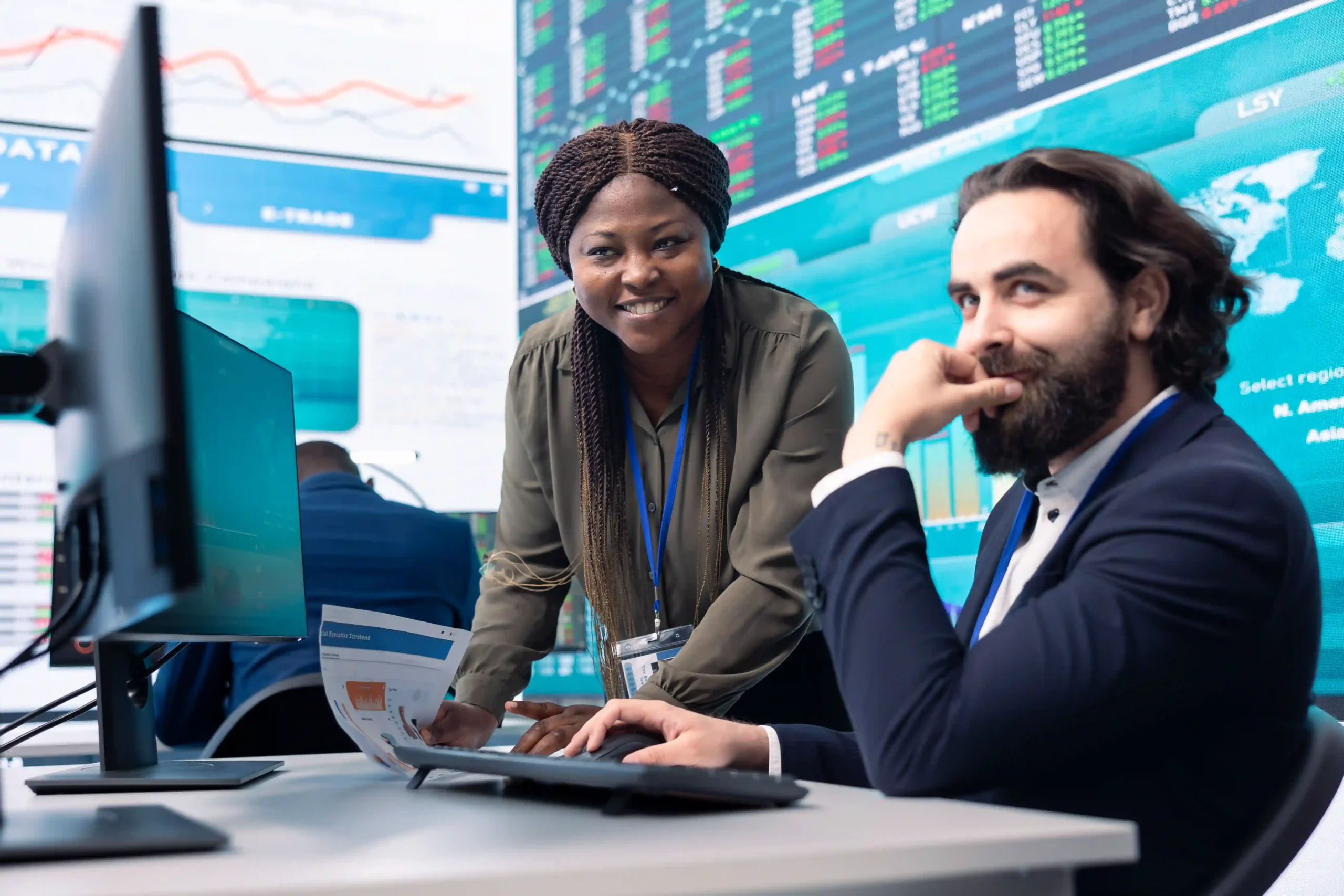Financial specialists analyzing supply chain finance innovation to improve cash flow and reduce procurement costs.
