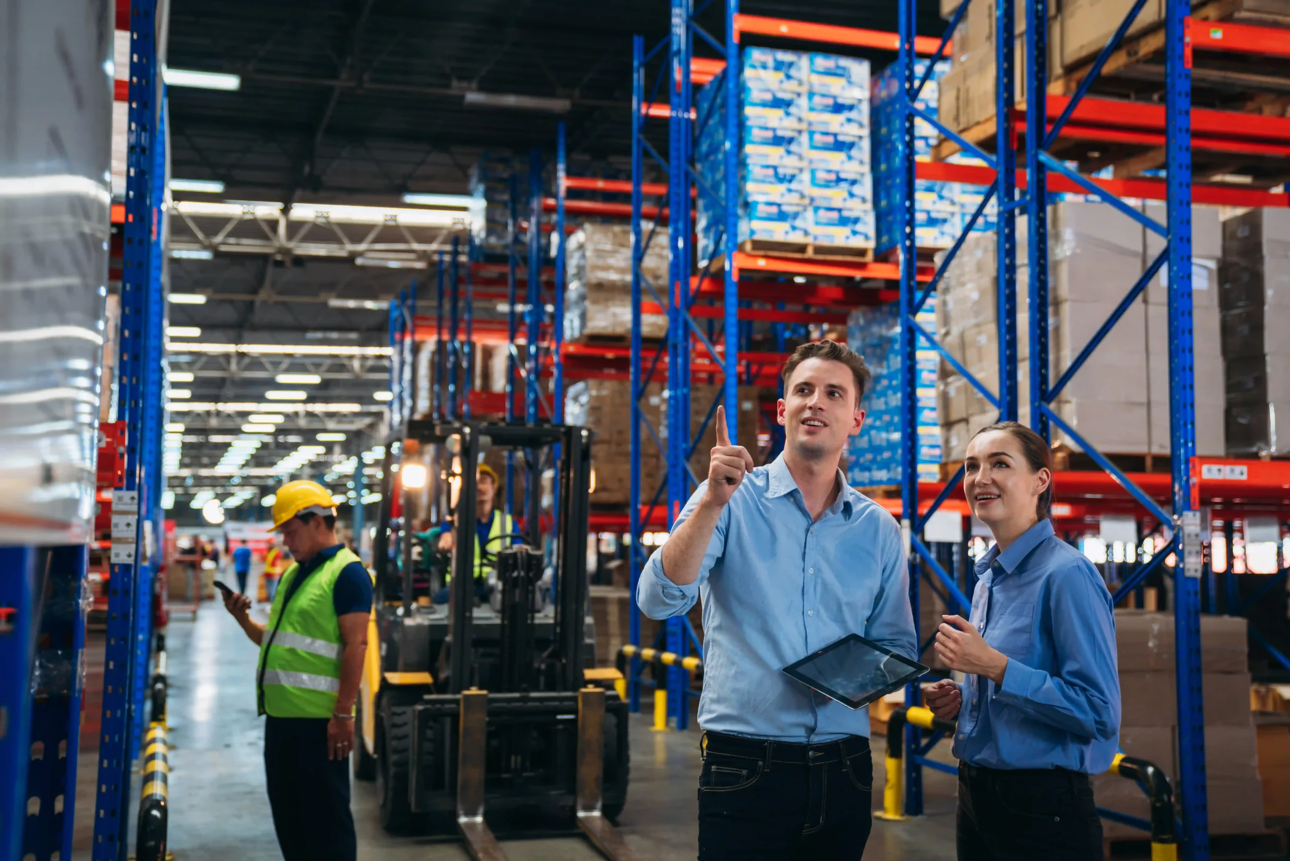 A warehouse worker scanning inventory for stock accuracy, reinforcing supply chain optimization meaning through effective inventory control.