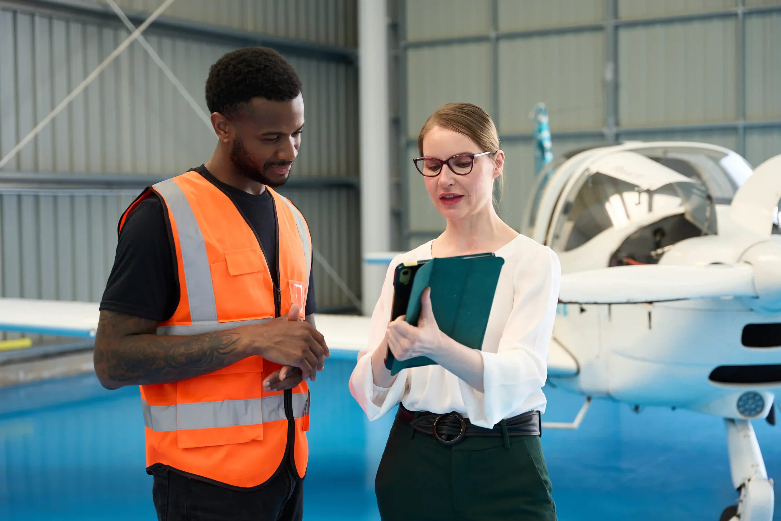 Aviation professionals conducting maintenance training, contributing to airline industry size expansion.