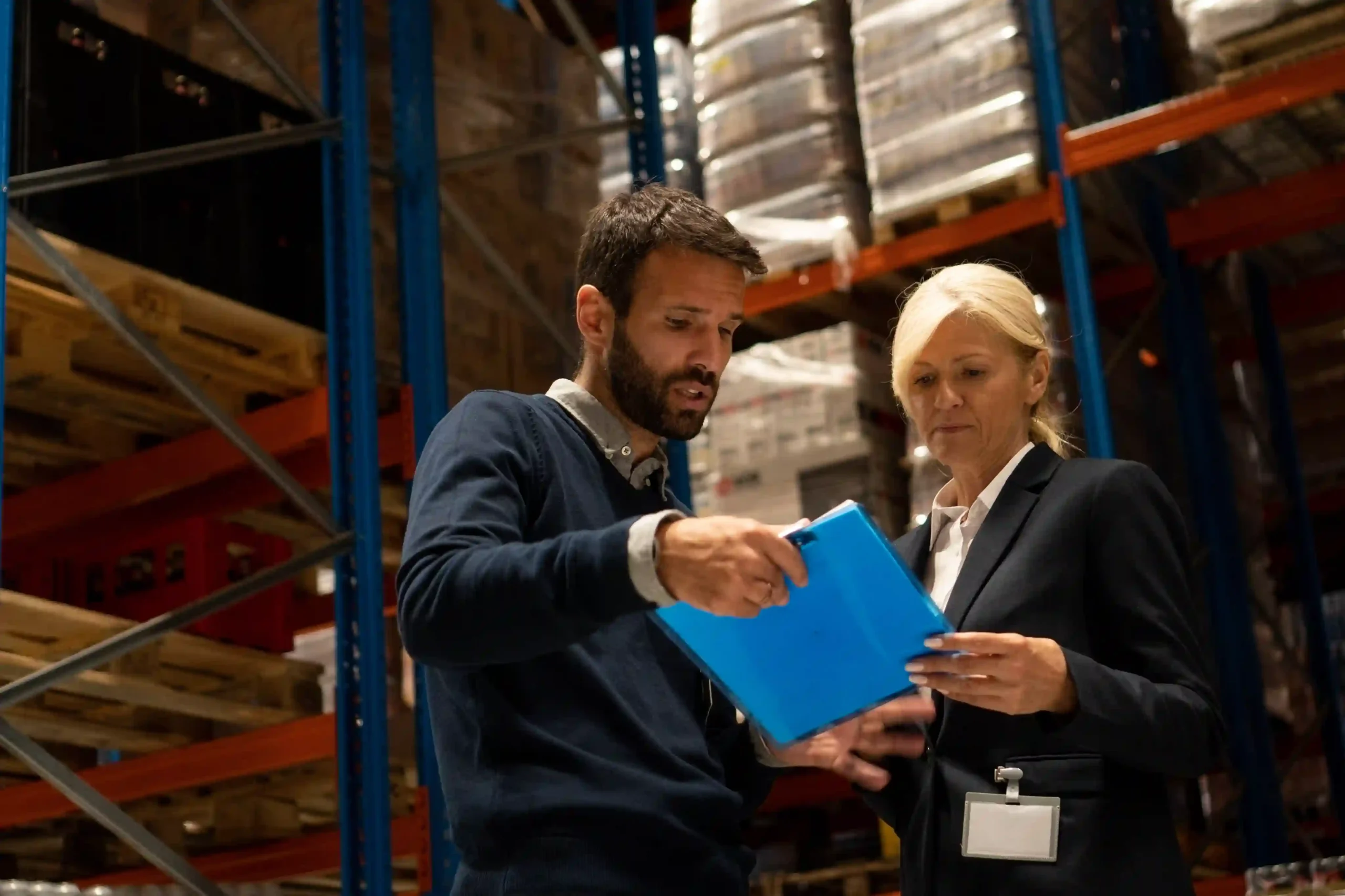 Logistics team analyzing data to improve processes using supply chain optimization technologies Amazon influenced.