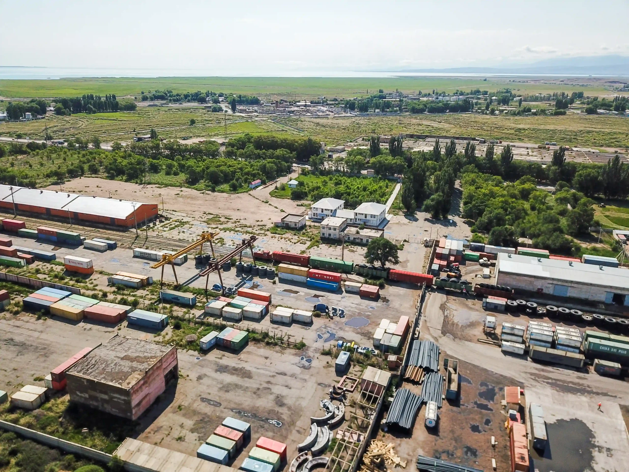 Aerial view of a foreign trade zone facility with stacked containers used for ftz consulting services.