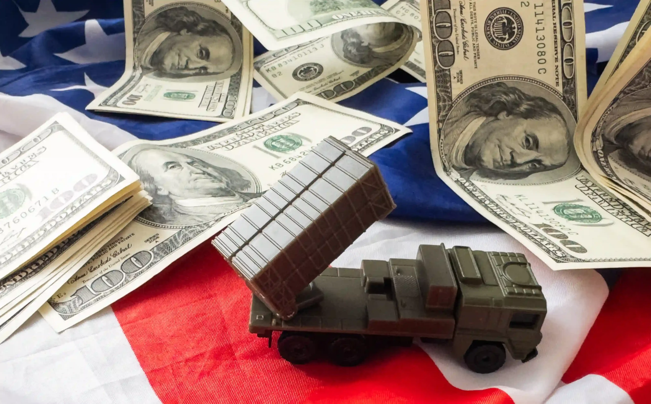 De minimis UK to USA rule change showing shipping costs and tariffs with U.S. dollars and trade imagery.