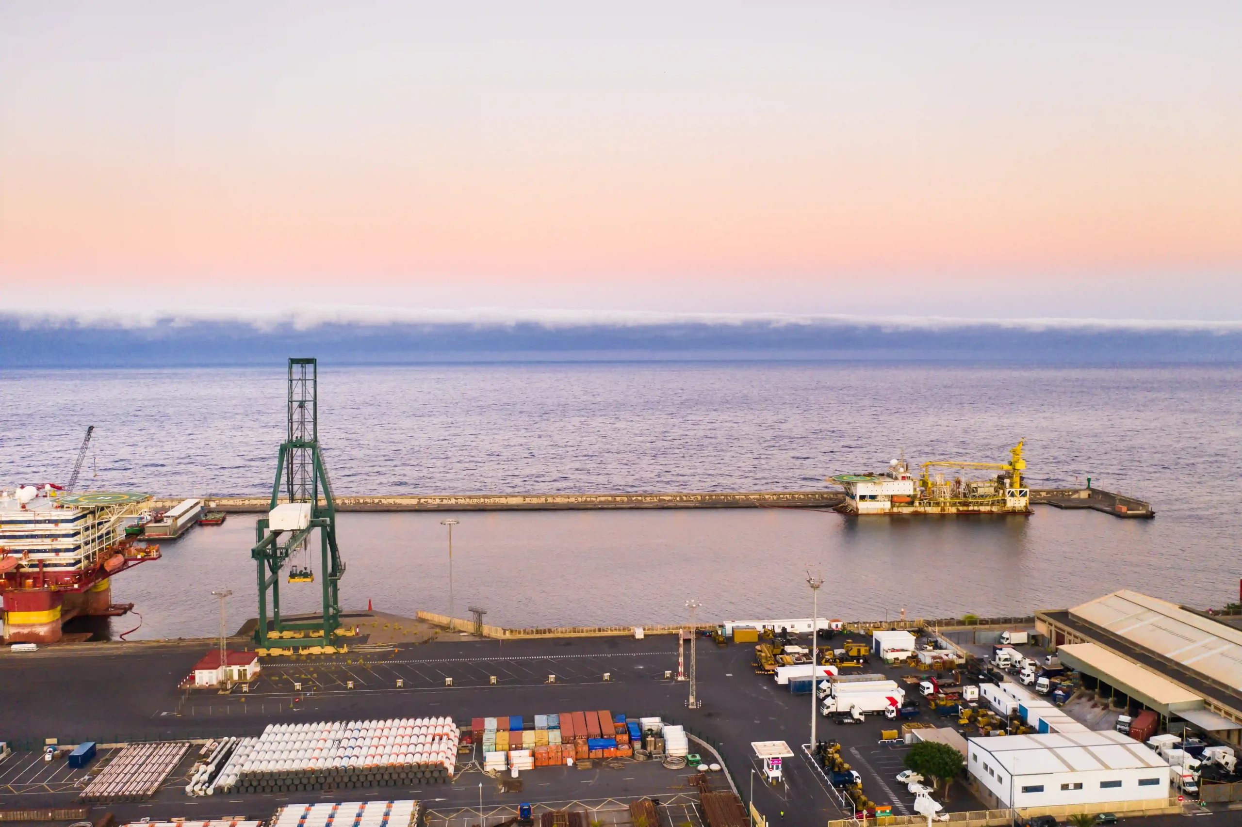 Seaport with cranes and cargo areas representing import strategies tied to what is de minimis safe harbor.