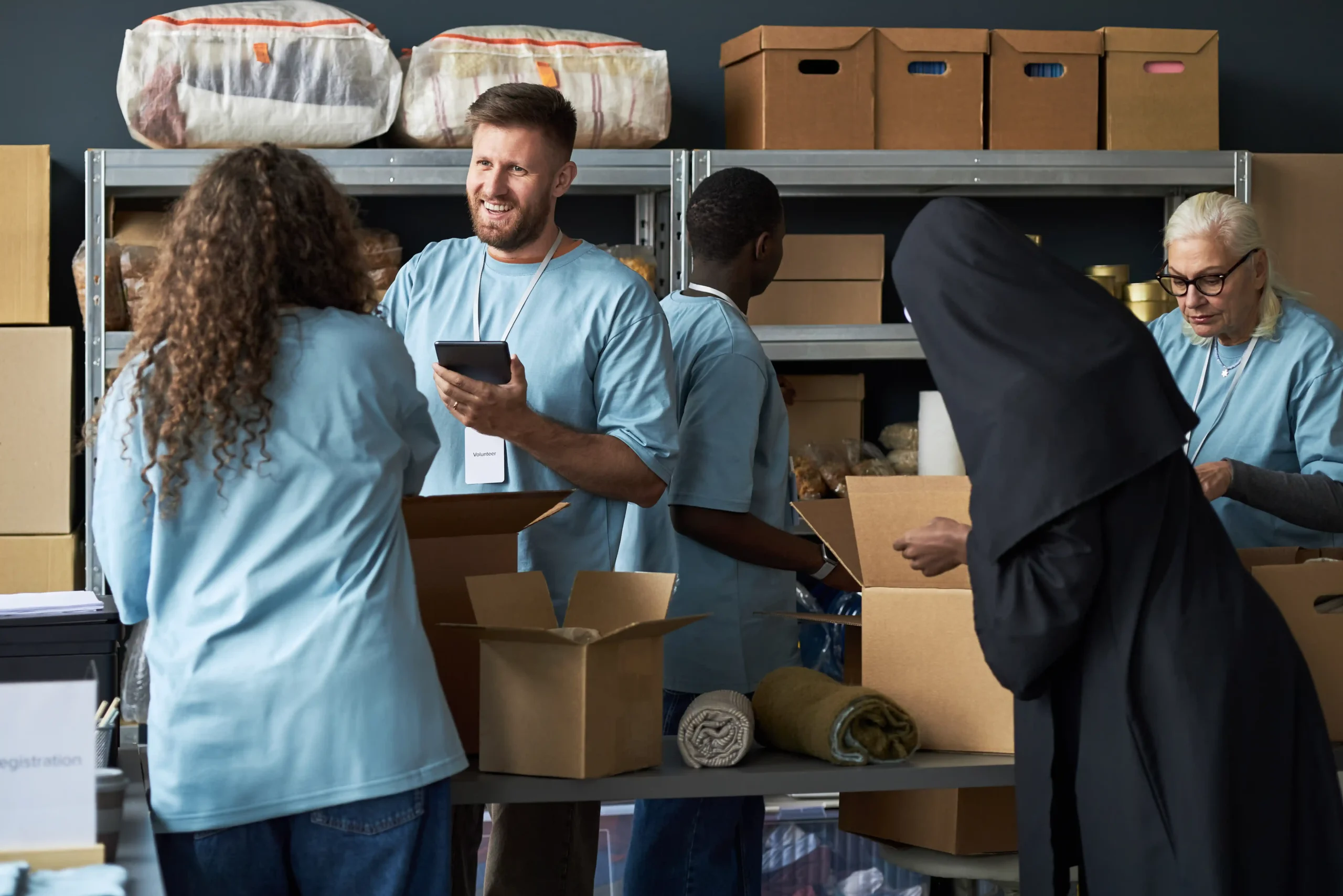 Warehouse staff organizing inventory and packing shipments inside a fulfillment services company operation