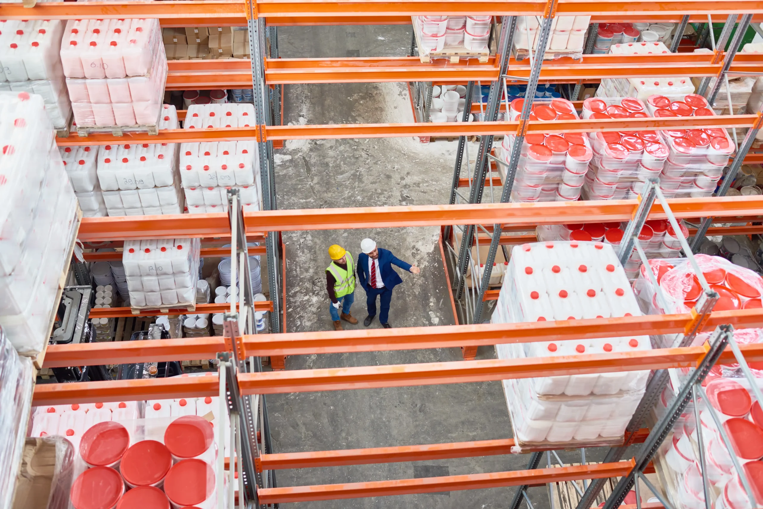 Aerial view of warehouse shelving and inventory zones designed for organized picking using bins for warehouse storage.