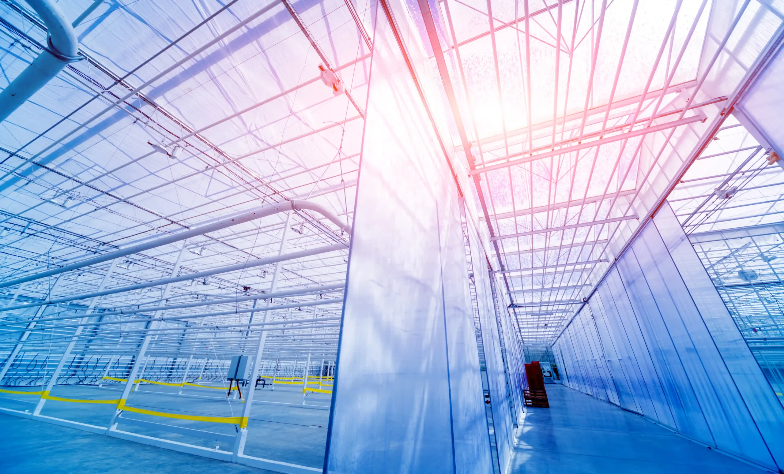 Modern warehouse storage tent featuring a clear-span frame and translucent fabric panels allowing natural light into the structure.