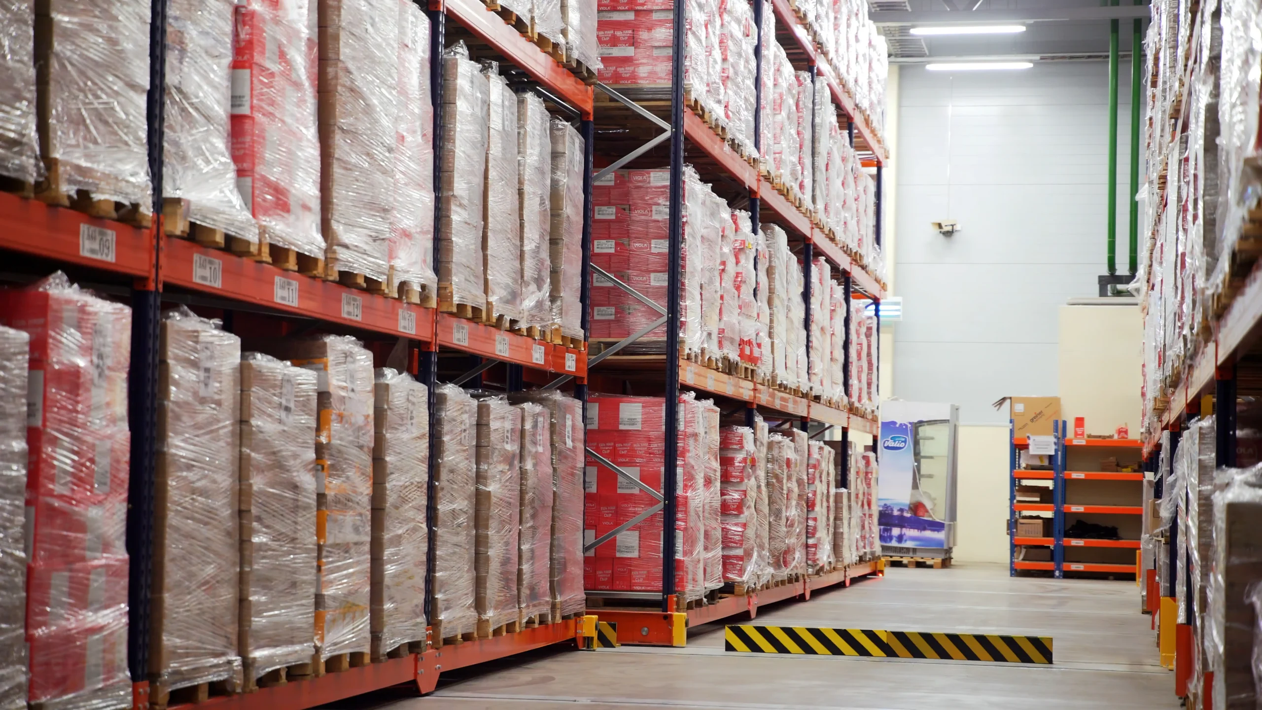 Product crates stored and staged inside a warehouse demonstrating secure handling within an advantage warehouse and logistics operation.