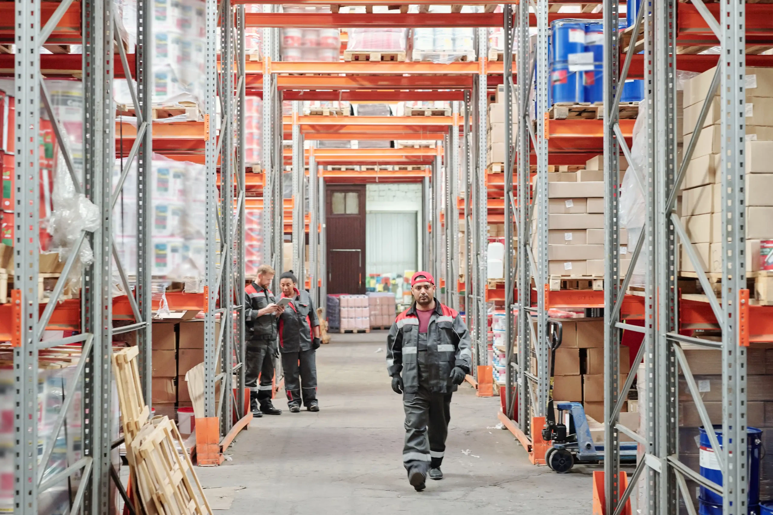 Warehouse and logistics coordinator coordinating daily warehouse activities to ensure smooth shipping and inventory handling